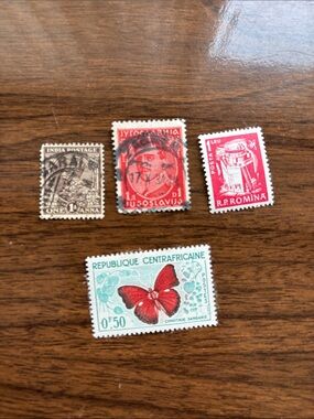 Vintage stamps from Romania, Yugoslavia, Central Africa and India.